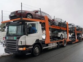 A general view of a trailer loaded with vehicles to send to Ukraine, which were confiscated from drunk drivers, in Riga, Latvia, March 8, 2023.