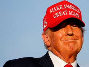 Former U.S. President Donald Trump speaks during a rally ahead of the midterm elections, in Miami, Fla., Nov. 6, 2022.