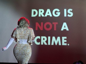 Bella DuBalle entertains spectators watching a drag performance ahead of the implementation of a Tennessee law restricting drag in front of minors that is due to come into force on April 1 at Atomic Rose in Memphis, Tenn., March 26, 2023.