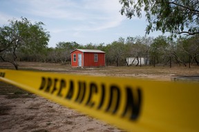 A general view of a storage shed behind a police cordon, at the scene where authorities found the bodies of two of four Americans kidnapped by gunmen, in Matamoros, Mexico March 7, 2023.