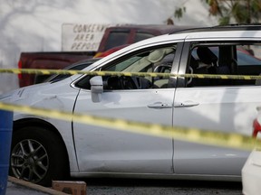 The car in which four Americans were kidnapped by gunman, as they travelled near the U.S. border with Brownsville, Texas, remains secured outside the Forensic Medical Service morgue building by Mexican authorities, in Matamoros, Mexico, March 7, 2023.