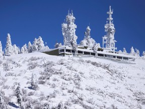 Ice covers communication towers as massive amounts of snow trap residents of mountain towns in San Bernadino County, Crestline, Calif., March 2, 2023.