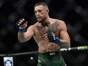 Jul 10, 2021; Las Vegas, Nevada, USA; Conor McGregor fights Dustin Poirier during UFC 264 at T-Mobile Arena.