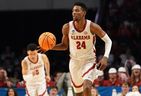 Mar 16, 2023; Birmingham, AL, USA;  Alabama Crimson Tide forward Brandon Miller (24) brings the ball up against the Texas A&M-CC Islanders during the first half in the first round of the 2023 NCAA Tournament at Legacy Arena. 
