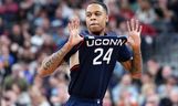 Mar 25, 2023; Las Vegas, NV, USA; Connecticut Huskies guard Jordan Hawkins (24) reacts against the Gonzaga Bulldogs during the second half for the NCAA tournament West Regional final at T-Mobile Arena. 