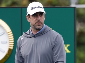 Aaron Rodgers prepares to tee off on the first tee during the third round of the AT&T Pebble Beach Pro-Am.