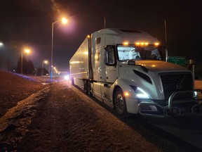 while pulling a full load on Hwy. 401 near Cambridge on Tuesday, March 21, 2023.