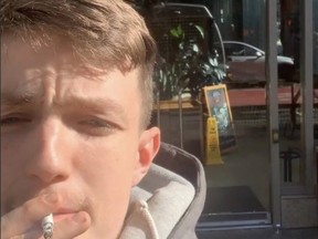 Witness who filmed and took selfies during Vancouver stabbing smoking outside Starbucks day after incident.