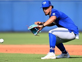 Feb 23, 2023; Dunedin, FL, USA;  Toronto Blue Jays second baseman Santiago Espinal fields a ground ball during spring training.