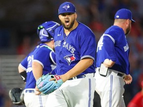 Toronto Blue Jays starting pitcher Alek Manoah (6) reacts after having to leave the game against the Philadelphia Phillies in the seventh inning during spring training at TD Ballpark.