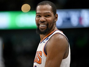 Mar 5, 2023; Dallas, Texas, USA; Phoenix Suns forward Kevin Durant exchanges words with the Dallas Mavericks fans during the second half at the American Airlines Center.