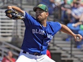 Toronto Blue Jays pitcher Yusei Kikuchi, of Japan, delivers to the Philadelphia Phillies during the first inning of a spring training baseball game Friday, March 17, 2023, in Dunedin, Fla.