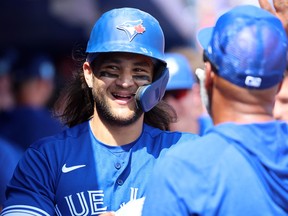 Blue Jays' Bo Bichette smiles after hitting a home run against the Boston Red Sox during the fourth inning at TD Ballpark on Monday, March 13, 2023.