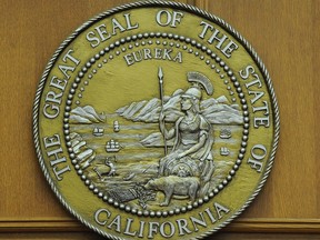 The seal of the state of California hangs in a closed courtroom at the Stanley Mosk Courthouse in downtown Los Angeles, March 16, 2009.