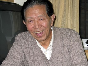 Military surgeon Jiang Yanyong is seen in a hotel room in Beijing on Feb. 9, 2004.
