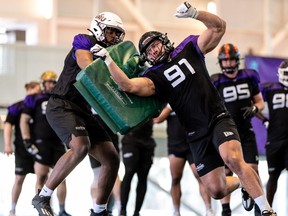 Max Parkinson (91) in a one-on-one drill at the CFL Combine.