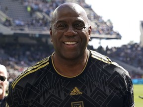 Former NBA player Magic Johnson smiles before an MLS Cup soccer match Nov. 5, 2022, in Los Angeles.