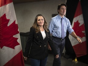 Deputy Prime Minister and Finance Minister Chrystia Freeland, along with Prime Minister Justin Trudeau, arrive at the Hamilton Convention Centre, in Hamilton, Ont., on Monday, Jan. 23, 2023.