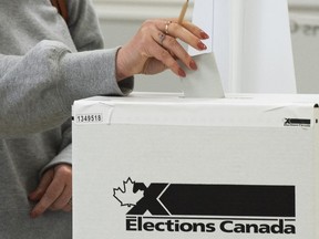 The author of a report evaluating the protocol of Canada's security services monitoring federal elections says there is no political consensus on when it is appropriate to notify the public of foreign interference.