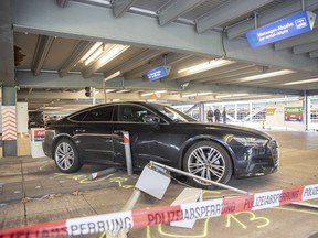 A damaged car is parked in parking lot 2 at Cologne/Bonn Airport Friday, March 24, 2023.