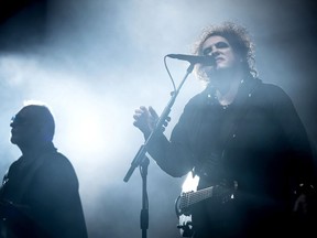 Robert Smith (R) and Reeves Gabrels of The Cure perform on the Pyramid stage on day five of Glastonbury Festival at Worthy Farm, Pilton on June 30, 2019 in Glastonbury, England.