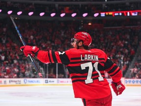 Feb 11, 2023; Detroit, Michigan, USA; Detroit Red Wings center Dylan Larkin (71) celebrates his goal during the second period against the Vancouver Canucks at Little Caesars Arena.
