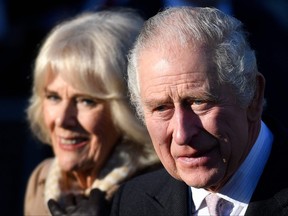 In this file photo taken on Jan. 20, 2023, King Charles III and Camilla, Queen Consort, leave after visiting Bolton Town Hall in Bolton, north west England, where they met with representatives from the community.