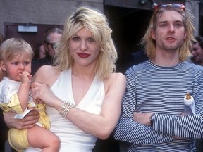Kurt Cobain with Courtney Love and Daughter Frances - Getty