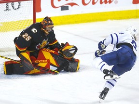 Calgary Flames goalie Jacob Markstrom stops Toronto Maple Leafs William Nylander in second period NHL action at the Scotiabank Saddledome in Calgary on Thursday, March 2, 2023.