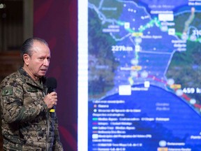 Handout picture released by the Mexican Presidency showing the Secretary of the Mexican Navy, Jose Rafael Ojeda, speaking during a press conference on the kidnapping of four U.S. citizens in the border city of Matamoros, Tuesday, March 7, 2023.
