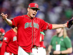 Giovanny Gallegos of Team Mexico celebrates after defeating Team Puerto Rico in the World Baseball Classic quarterfinals at loanDepot park on March 17, 2023 in Miami.