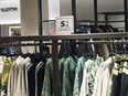 Sign of 5% off at Nordstrom liquidation sale.