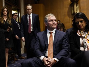 Alan Shaw, president and CEO of Norfolk Southern Corporation, waits to sit on a panel to testify before the Senate Environment and Public Works Committee on Capitol Hill on March 9, 2023 in Washington, D.C.