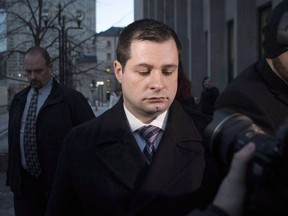 James Forcillo leaves court in Toronto on Jan. 25, 2016. A coroner has denied a request from a former Toronto police officer who shot a distraught teen on an empty streetcar to explore a theory the youth was committing "suicide by cop."