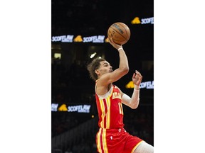 Atlanta Hawks guard Trae Young shoots during the second half of an NBA basketball game against Indiana Pacer, Saturday, March 25, 2023, in Atlanta.