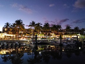 The Perry Hotel and Marina is lit up at dusk in Key West, Fla. (Dave Pollard/Toronto Sun)