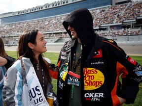 Pete Davidson and Chase Sui Wonders are seen during the NASCAR Cup Series 65th Annual Daytona 500 at Daytona International Speedway in Daytona Beach, Fla., Feb. 19, 2023.