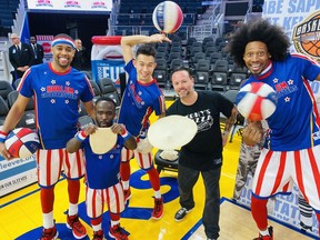 Tony Gemignani with members of the Harlem Globetrotters in 2018. He has performed with them many times.