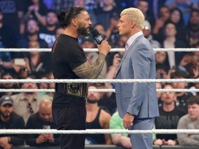 Roman Reigns, left, and Cody Rhodes stare each other down in the run-up to WrestleMania this weekend. Supplied photo