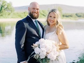 Construction worker Graeme Reed, 38, seen here with his wife Taylor, was badly injured when he was hit by an alleged impaired driver while working on the Allen Expressway on Feb. 10, 2023.