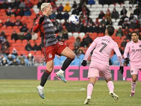 Mar 18, 2023; Toronto, Ontario, CAN;   Toronto FC midfielder Federico Bernardeschi (10) battles for the ball with Inter Miami midfielder Jean Mota (7) in the second half at BMO Field.