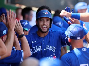 Blue Jays' George Springer celebrates after hitting a home run against the Philadelphia Phillies during the third inning at BayCare Ballpark.