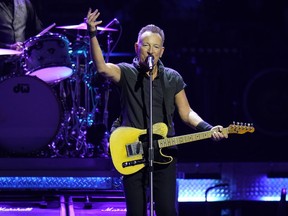 Bruce Springsteen and the E Street Band perform during their 2023 tour on Feb. 1, 2023, at Amalie Arena in Tampa, Fla. Springsteen's planned performance Tuesday, March 14, in Albany, N.Y., has become the third concert in a week postponed by the New Jersey rocker due to illness.
