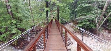 The suspension bridge leading the the Bunkhouse at Glen Oaks Resort. SARA SHANTZ PHOTO