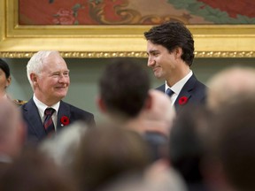 Prime Minister Justin Trudeau stands with Governor General David Johnston after being sworn in as Prime Minister at Rideau Hall in Ottawa on Wednesday, Nov. 4, 2015.