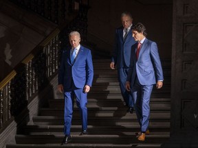 President Joe Biden, left, Prime Minister Justin Trudeau, right and Mexican President Andres Manuel Lopez Obrador, arrive for a news conference in Mexico City, Tuesday, Jan. 10, 2023.