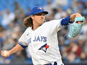 Toronto Blue Jays starting pitcher Kevin Gausman delivers a pitch against the Detroit Tigers in the first inning at Rogers Centre on April 12, 2023.