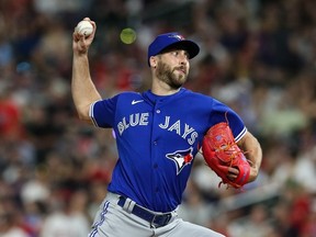 Anthony Bass of the Toronto Blue Jays delivers a pitch.