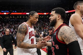 DeMar DeRozan meets with Fred VanVleet after defeating the Toronto Raptors during the 2023 Play-In Tournament at the Scotiabank Arena on April 12, 2023.