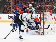 Phillip Danault of the Los Angeles Kings watches his shot go past Stuart Skinner of the Edmonton Oilers in the second period in Game Two of the First Round of the 2023 Stanley Cup Playoffs on April 19, 2023 at Rogers Place in Edmonton, Alberta, Canada.